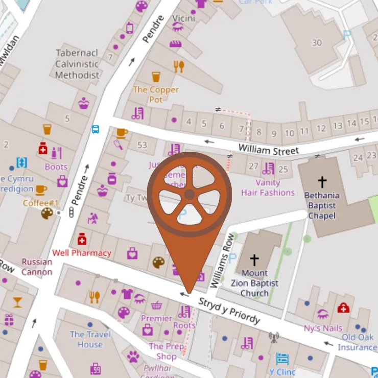 A map with a large orange Mobility Mapper marker, indicating the location of a dropped kerb or barrier.